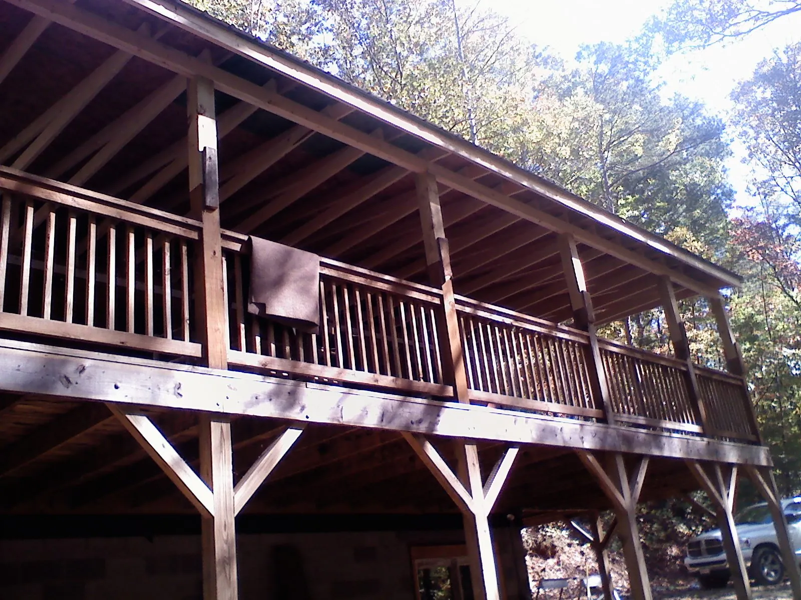 Timber framing under a new elevated porch and deck — Roof Leak Repair in Star Junction by Roofing Brothers